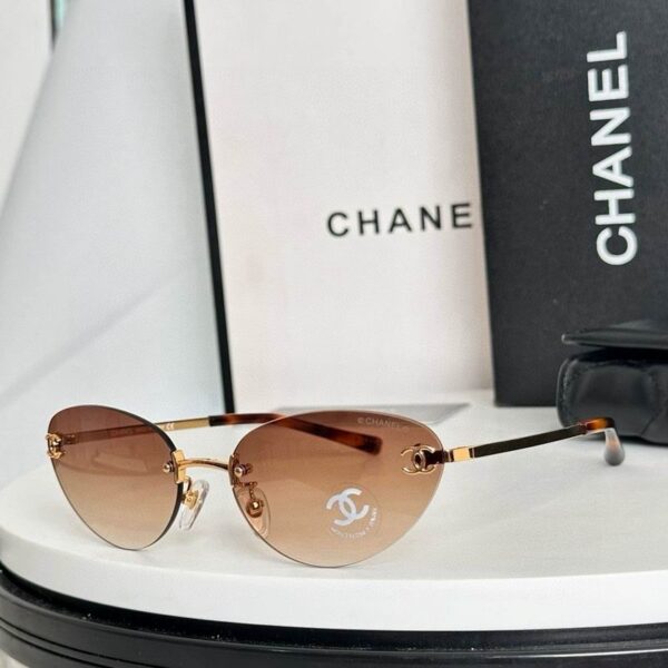 Chanel Vintage Rimless Oval Sunglasses – Minimalist Luxury Metal Frame