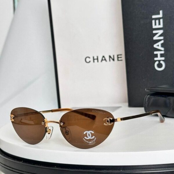 Chanel Vintage Rimless Oval Sunglasses – Minimalist Luxury Metal Frame