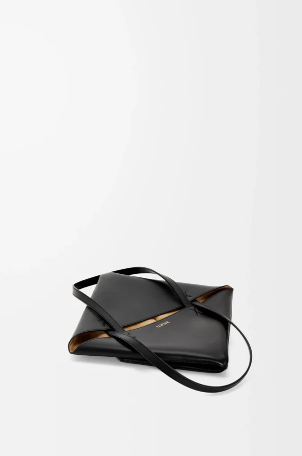 Medium Puzzle Fold tote in shiny calfskin Black