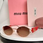 Miu Miu Vintage Round Logo Accent Sunglasses
