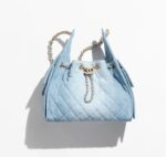 CHANEL 25 small denim handbag