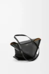 Medium Puzzle Fold tote in shiny calfskin Black