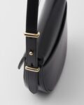 Prada Arqué flip leather shoulder bag