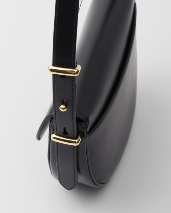 Prada Arqué flip leather shoulder bag