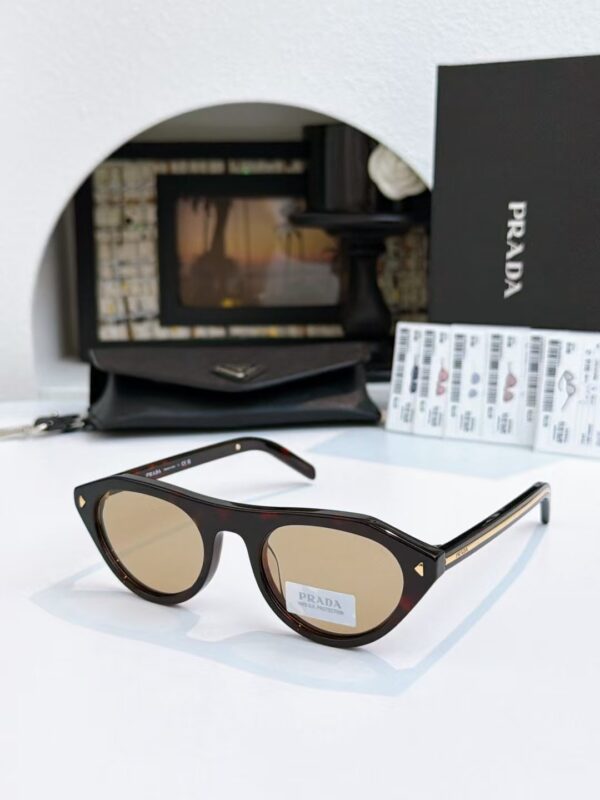 Prada Narrow Cat-Eye Sunglasses: Minimalist Luxury UV