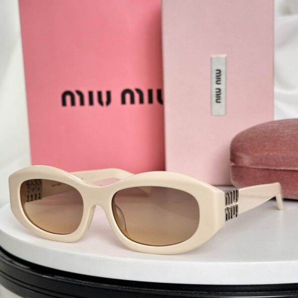 MiuMiu Retro Oval Sunglasses – Luxury Statement Eyewear for Women
