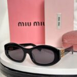 MiuMiu Retro Oval Sunglasses – Luxury Statement Eyewear for Women