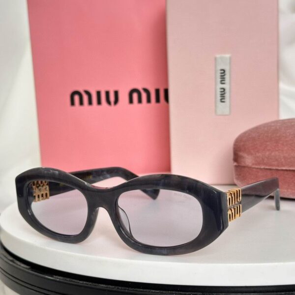 MiuMiu Retro Oval Sunglasses – Luxury Statement Eyewear for Women