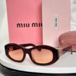 MiuMiu Retro Oval Sunglasses – Luxury Statement Eyewear for Women