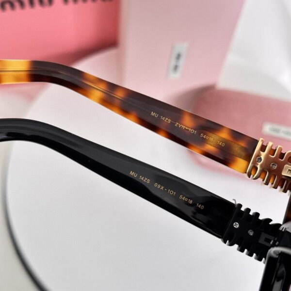 MiuMiu Retro Oval Sunglasses – Luxury Statement Eyewear for Women