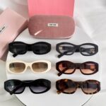 MiuMiu Retro Oval Sunglasses – Luxury Statement Eyewear for Women