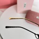 Miu Miu Cat-Eye Sunglasses | Elegant Upturned Frame Metal UV400 Protection