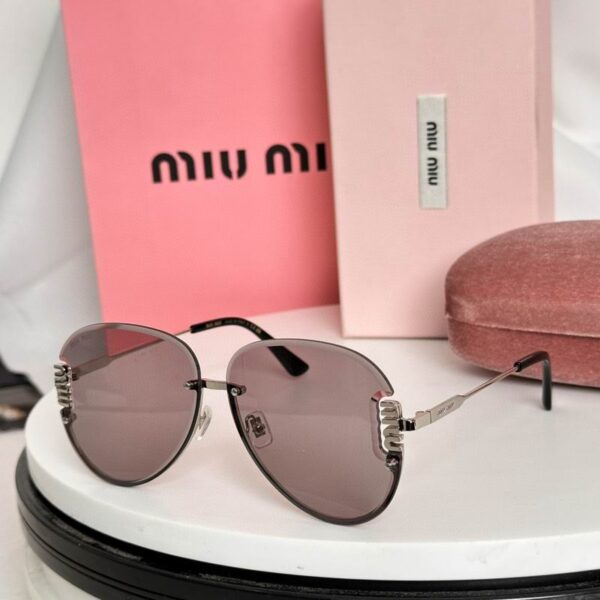 Miu Miu Elegant Rimless Sunglasses – Premium Oval Frame UV Protection