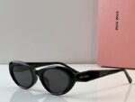 MiuMiu Retro Oval Statement Sunglasses