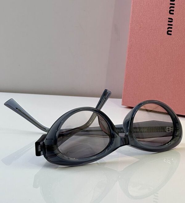 MiuMiu Retro Oval Statement Sunglasses