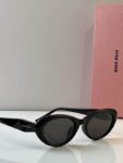 MiuMiu Retro Oval Statement Sunglasses