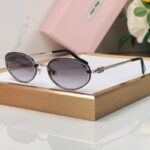 Miu Miu Retro Oval Metal Sunglasses – Slim Frame Collection
