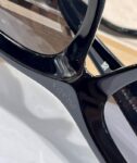Prada Cat-Eye Triangle Logo Sunglasses