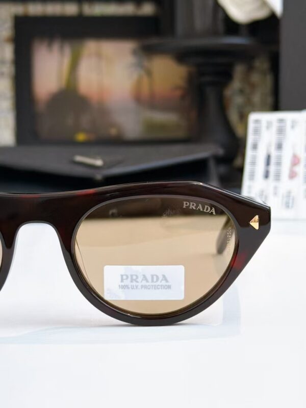Prada Narrow Cat-Eye Sunglasses: Minimalist Luxury UV