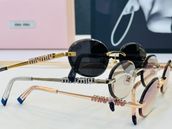 Miu Miu Vintage Oval Rimless Sunglasses – Luxury Minimalist Designer Shades
