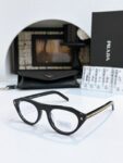 Prada Narrow Cat-Eye Sunglasses: Minimalist Luxury UV